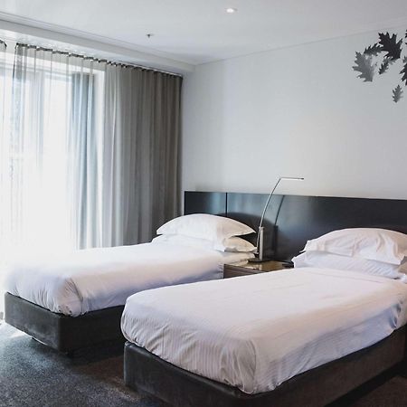The Como Ville de Melbourne Extérieur photo A room at the hotel