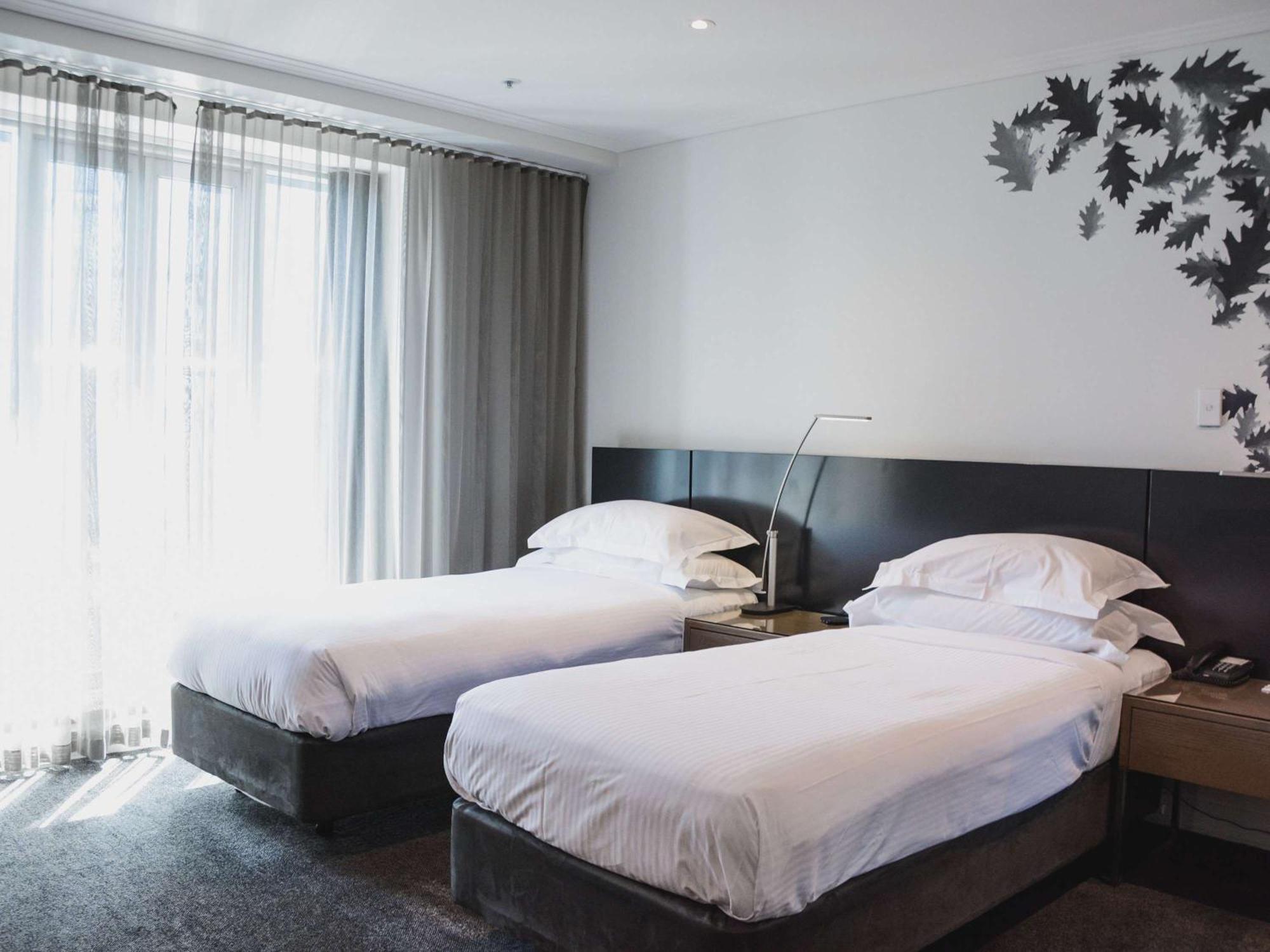 The Como Ville de Melbourne Extérieur photo A room at the hotel